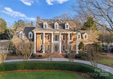 This distinctive home offers six bedrooms and five and a half on Providence Country Club in North Carolina - for sale on GolfHomes.com, golf home, golf lot