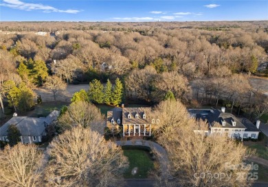 This distinctive home offers six bedrooms and five and a half on Providence Country Club in North Carolina - for sale on GolfHomes.com, golf home, golf lot