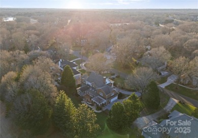 This distinctive home offers six bedrooms and five and a half on Providence Country Club in North Carolina - for sale on GolfHomes.com, golf home, golf lot