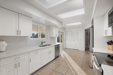 Stunning TURNKEY updated WATERFRONT home in Leisure World! Enjoy on Leisure World Country Club in Arizona - for sale on GolfHomes.com, golf home, golf lot