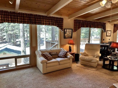 This beautifully maintained cabin features a spacious open floor on Lake Almanor Country Club in California - for sale on GolfHomes.com, golf home, golf lot