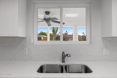 Stunning TURNKEY updated WATERFRONT home in Leisure World! Enjoy on Leisure World Country Club in Arizona - for sale on GolfHomes.com, golf home, golf lot