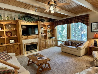 This beautifully maintained cabin features a spacious open floor on Lake Almanor Country Club in California - for sale on GolfHomes.com, golf home, golf lot
