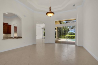 STUNNING POOL HOME WITH SWEEPING GOLF COURSE VIEW IN PGA on PGA Golf Club in PGA Village in Florida - for sale on GolfHomes.com, golf home, golf lot