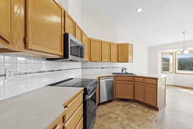 Discover peace, privacy, and panoramic beauty in this 3-bedroom on Hangman Valley Golf Course in Washington - for sale on GolfHomes.com, golf home, golf lot