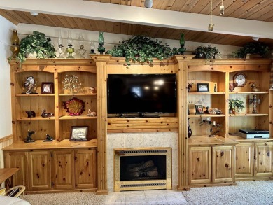 This beautifully maintained cabin features a spacious open floor on Lake Almanor Country Club in California - for sale on GolfHomes.com, golf home, golf lot