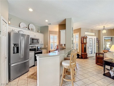 This OVERSIZED Ibis II POOL HOME with a private PRESERVE VIEW in on Herons Glen Golf and Country Club in Florida - for sale on GolfHomes.com, golf home, golf lot