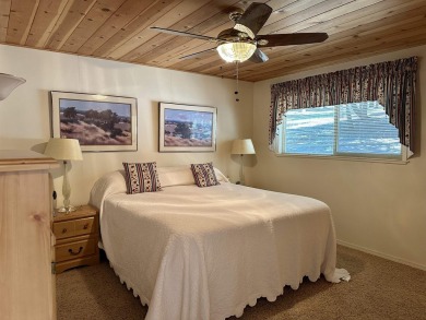 This beautifully maintained cabin features a spacious open floor on Lake Almanor Country Club in California - for sale on GolfHomes.com, golf home, golf lot