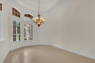 STUNNING POOL HOME WITH SWEEPING GOLF COURSE VIEW IN PGA on PGA Golf Club in PGA Village in Florida - for sale on GolfHomes.com, golf home, golf lot