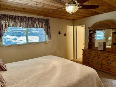 This beautifully maintained cabin features a spacious open floor on Lake Almanor Country Club in California - for sale on GolfHomes.com, golf home, golf lot