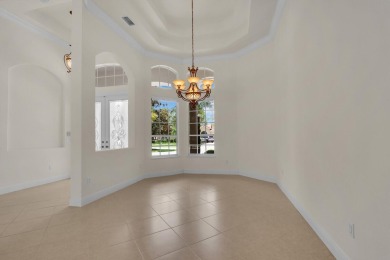 STUNNING POOL HOME WITH SWEEPING GOLF COURSE VIEW IN PGA on PGA Golf Club in PGA Village in Florida - for sale on GolfHomes.com, golf home, golf lot