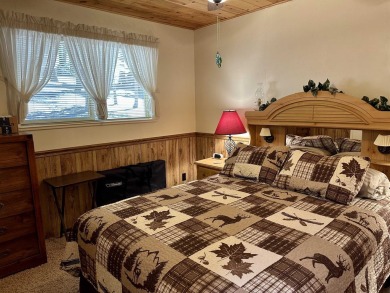 This beautifully maintained cabin features a spacious open floor on Lake Almanor Country Club in California - for sale on GolfHomes.com, golf home, golf lot