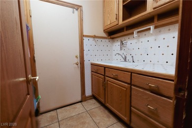 Tucked at the end of a quiet cul-de-sac in the heart of Southern on Southern Highlands Golf Club in Nevada - for sale on GolfHomes.com, golf home, golf lot