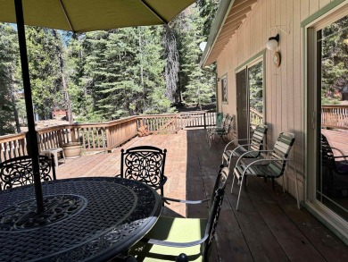 This beautifully maintained cabin features a spacious open floor on Lake Almanor Country Club in California - for sale on GolfHomes.com, golf home, golf lot