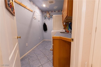 Tucked at the end of a quiet cul-de-sac in the heart of Southern on Southern Highlands Golf Club in Nevada - for sale on GolfHomes.com, golf home, golf lot