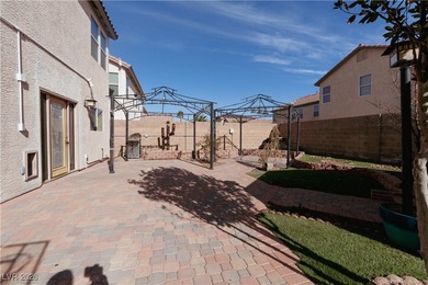 Tucked at the end of a quiet cul-de-sac in the heart of Southern on Southern Highlands Golf Club in Nevada - for sale on GolfHomes.com, golf home, golf lot