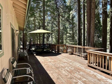 This beautifully maintained cabin features a spacious open floor on Lake Almanor Country Club in California - for sale on GolfHomes.com, golf home, golf lot