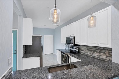 DON'T WAIT TO SEE THIS VILLA!!  2BD/2BA WITH HIGH END UPGRADES on Pelican Pointe Golf and Country Club in Florida - for sale on GolfHomes.com, golf home, golf lot