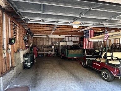 This beautifully maintained cabin features a spacious open floor on Lake Almanor Country Club in California - for sale on GolfHomes.com, golf home, golf lot