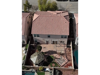 Tucked at the end of a quiet cul-de-sac in the heart of Southern on Southern Highlands Golf Club in Nevada - for sale on GolfHomes.com, golf home, golf lot