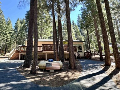 This beautifully maintained cabin features a spacious open floor on Lake Almanor Country Club in California - for sale on GolfHomes.com, golf home, golf lot
