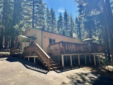 This beautifully maintained cabin features a spacious open floor on Lake Almanor Country Club in California - for sale on GolfHomes.com, golf home, golf lot