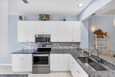 DON'T WAIT TO SEE THIS VILLA!!  2BD/2BA WITH HIGH END UPGRADES on Pelican Pointe Golf and Country Club in Florida - for sale on GolfHomes.com, golf home, golf lot