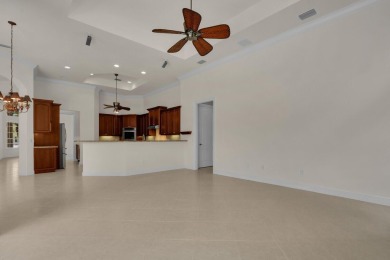 STUNNING POOL HOME WITH SWEEPING GOLF COURSE VIEW IN PGA on PGA Golf Club in PGA Village in Florida - for sale on GolfHomes.com, golf home, golf lot