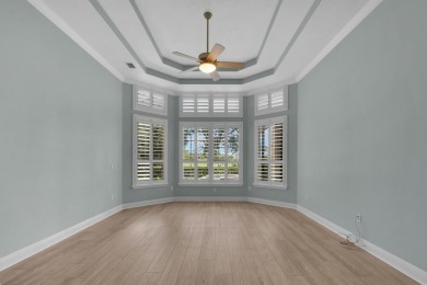 STUNNING POOL HOME WITH SWEEPING GOLF COURSE VIEW IN PGA on PGA Golf Club in PGA Village in Florida - for sale on GolfHomes.com, golf home, golf lot