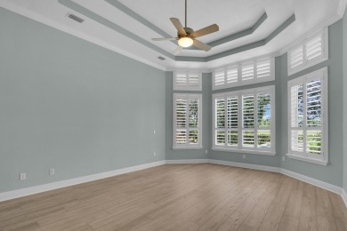 STUNNING POOL HOME WITH SWEEPING GOLF COURSE VIEW IN PGA on PGA Golf Club in PGA Village in Florida - for sale on GolfHomes.com, golf home, golf lot
