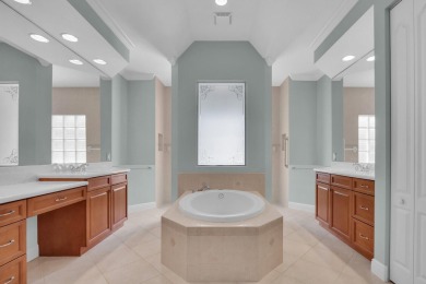 STUNNING POOL HOME WITH SWEEPING GOLF COURSE VIEW IN PGA on PGA Golf Club in PGA Village in Florida - for sale on GolfHomes.com, golf home, golf lot