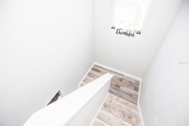 This beautifully renovated home is move-in ready and offers a on Remington Golf Club in Florida - for sale on GolfHomes.com, golf home, golf lot