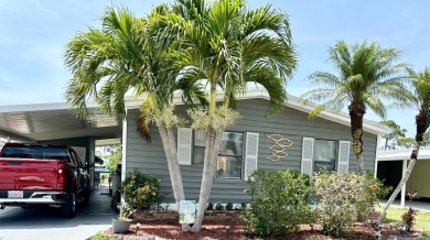 Situated on a spacious corner lot, this home features an on Lake Fairways Country Club in Florida - for sale on GolfHomes.com, golf home, golf lot