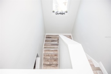 This beautifully renovated home is move-in ready and offers a on Remington Golf Club in Florida - for sale on GolfHomes.com, golf home, golf lot