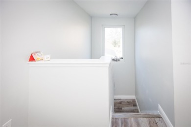 This beautifully renovated home is move-in ready and offers a on Remington Golf Club in Florida - for sale on GolfHomes.com, golf home, golf lot