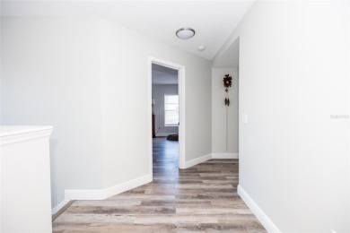 This beautifully renovated home is move-in ready and offers a on Remington Golf Club in Florida - for sale on GolfHomes.com, golf home, golf lot