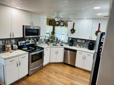 Situated on a spacious corner lot, this home features an on Lake Fairways Country Club in Florida - for sale on GolfHomes.com, golf home, golf lot