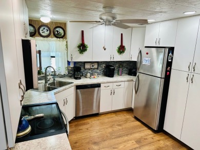 Situated on a spacious corner lot, this home features an on Lake Fairways Country Club in Florida - for sale on GolfHomes.com, golf home, golf lot
