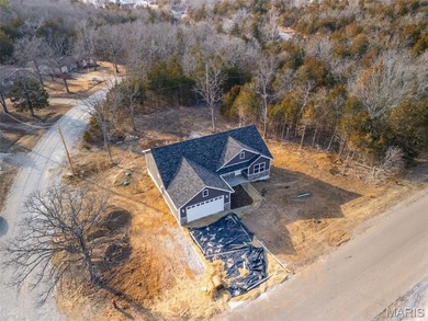 Charming brand new 3 bed, 2 bath home ideally located within on Terre Du Lac Golf and Country Club in Missouri - for sale on GolfHomes.com, golf home, golf lot