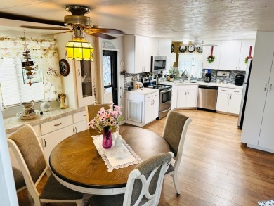 Situated on a spacious corner lot, this home features an on Lake Fairways Country Club in Florida - for sale on GolfHomes.com, golf home, golf lot