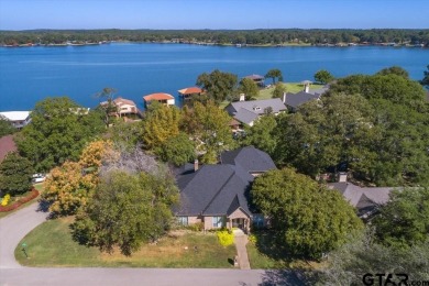 Experience the breathtaking beauty of this 3/3.5/3 estate on Emerald Bay Club in Texas - for sale on GolfHomes.com, golf home, golf lot