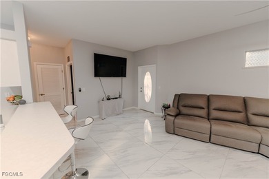 Cornered 3 bedroom/2 bath condo unit. New tile flooring on Majestic Golf Club in Florida - for sale on GolfHomes.com, golf home, golf lot