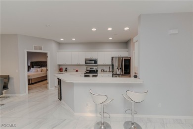 Cornered 3 bedroom/2 bath condo unit. New tile flooring on Majestic Golf Club in Florida - for sale on GolfHomes.com, golf home, golf lot