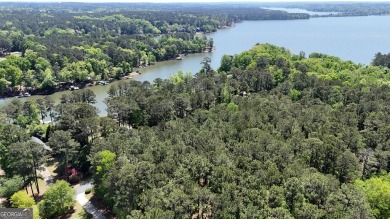 THIS IS A MEMBERSHIP AVAILABLE LOT - Wooded gently sloping to on Reynolds Lake Oconee - The Landing in Georgia - for sale on GolfHomes.com, golf home, golf lot