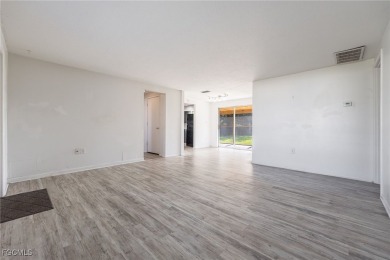 This affordable gem is perfect for a first-time homebuyer or on Port Charlotte Golf Club in Florida - for sale on GolfHomes.com, golf home, golf lot