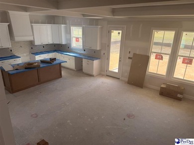 Step into timeless elegance with this new construction home by on The Traces Golf Club in South Carolina - for sale on GolfHomes.com, golf home, golf lot