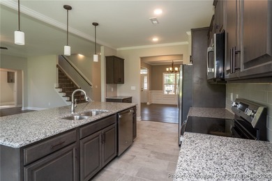 Located in a Gated, golf community with top-rated Jack Britt on Gates Four Golf and Country Club in North Carolina - for sale on GolfHomes.com, golf home, golf lot