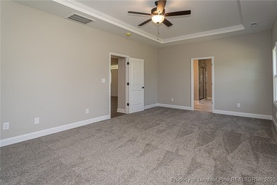 Located in a Gated, golf community with top-rated Jack Britt on Gates Four Golf and Country Club in North Carolina - for sale on GolfHomes.com, golf home, golf lot