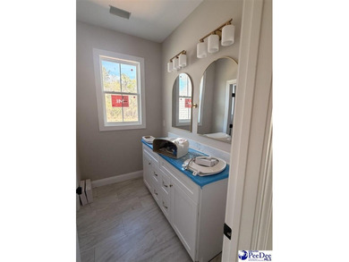 Step into timeless elegance with this new construction home by on The Traces Golf Club in South Carolina - for sale on GolfHomes.com, golf home, golf lot