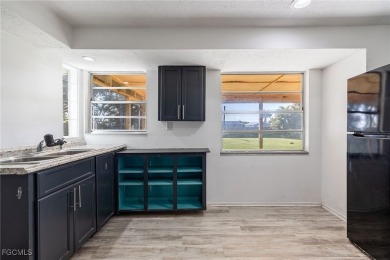 This affordable gem is perfect for a first-time homebuyer or on Port Charlotte Golf Club in Florida - for sale on GolfHomes.com, golf home, golf lot